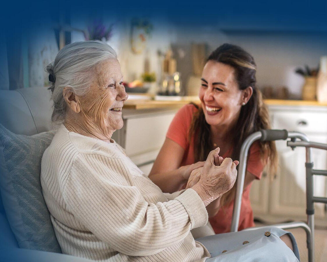 caregiver with senior couple